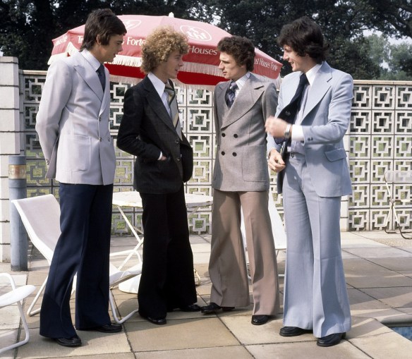 DON'T GO DOWN THE MINE, DAD (THERE'S PLENTY OF SLACK IN YOUR TROUSERS). Arsenal players David O'Leary, Graham Rix, Trevor Ross and Frank Stapleton in Norwich ahead of a match against the Canaries in 1977.