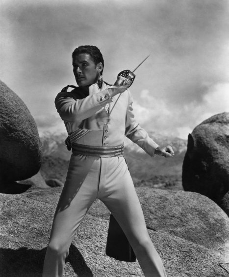 1936 : The Chargeof the Light Brigade.  Errol Flynn flashes not only his Sabre but also his avocado collection.
